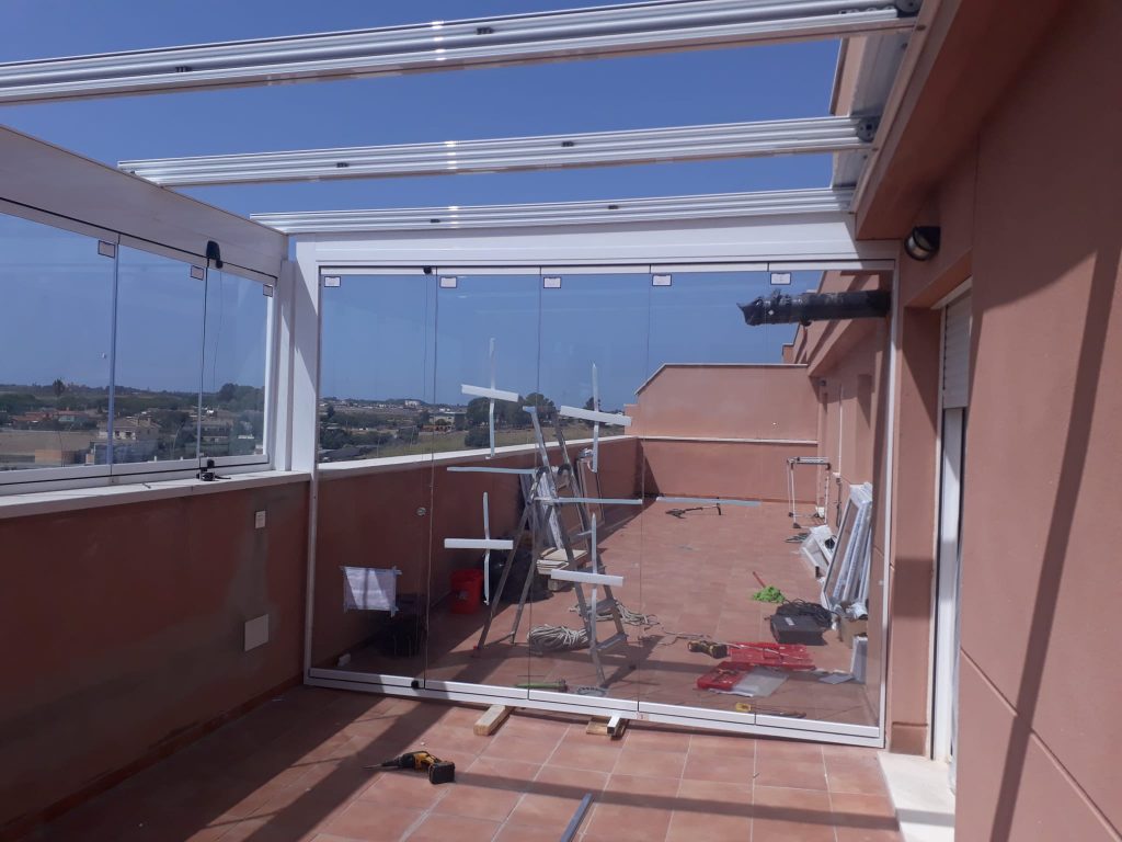Instalación techo de cristal y cortina de cristal