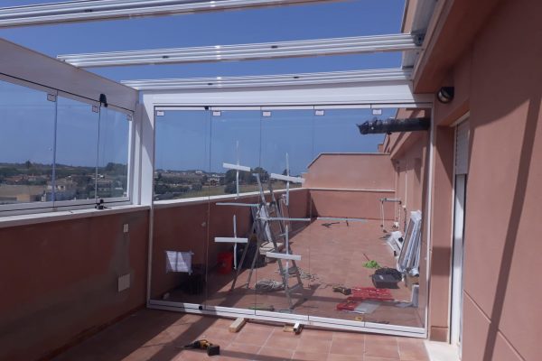 Instalación techo de cristal y cortina de cristal