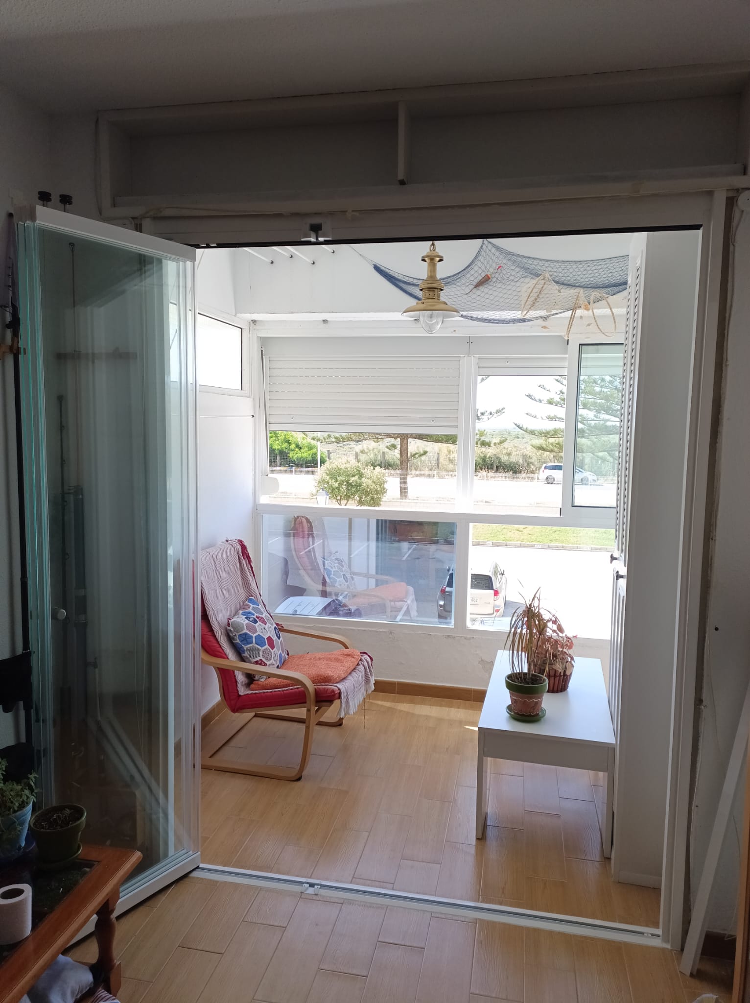 Cortina de cristal a medida para vivienda